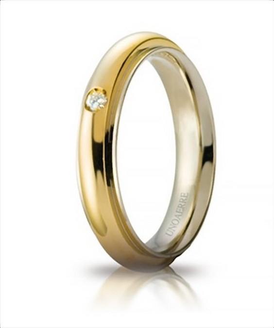 Fede oro giallo e bianco con diamante Andromeda UNOAERRE|bonini-gioielli