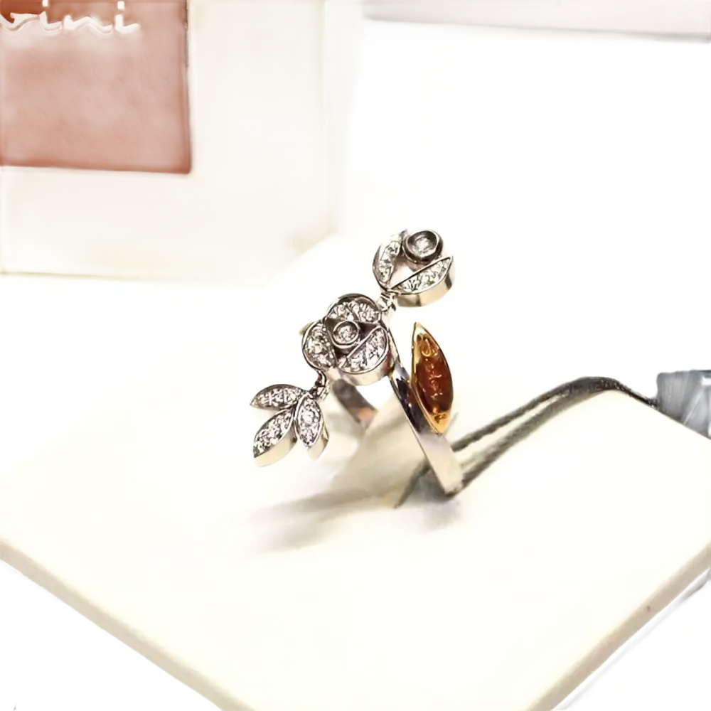 Anello in oro e diamanti ct 0,18 Provence di Salvini con design floreale e ambra
