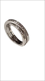 Anello Salvini oro bianco e diamanti con tre bande intrecciate e brillanti