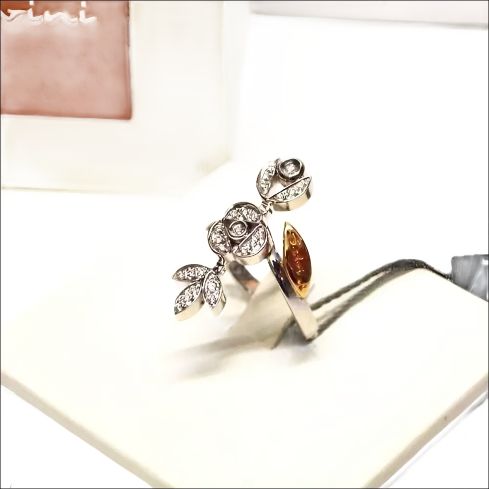 Anello in oro e diamanti ct 0,18 Provence di Salvini con design floreale e ambra