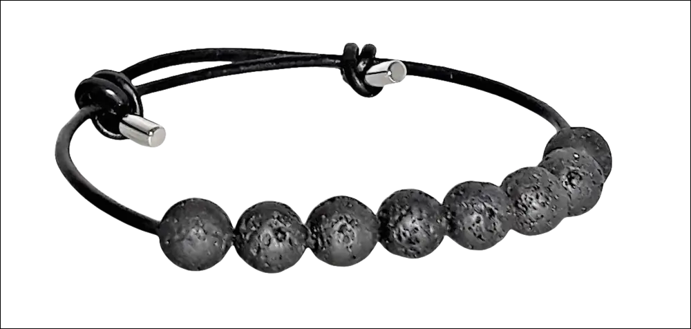 Bracciale Calvin Klein Soulful Onice Nero in pelle nera con sette perle scure e fibbie in argento