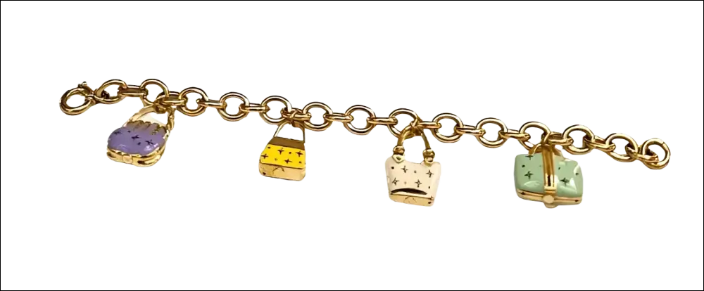 Bracciale donna oro giallo con ciondoli borsette viola, gialla, bianca stellata, menta