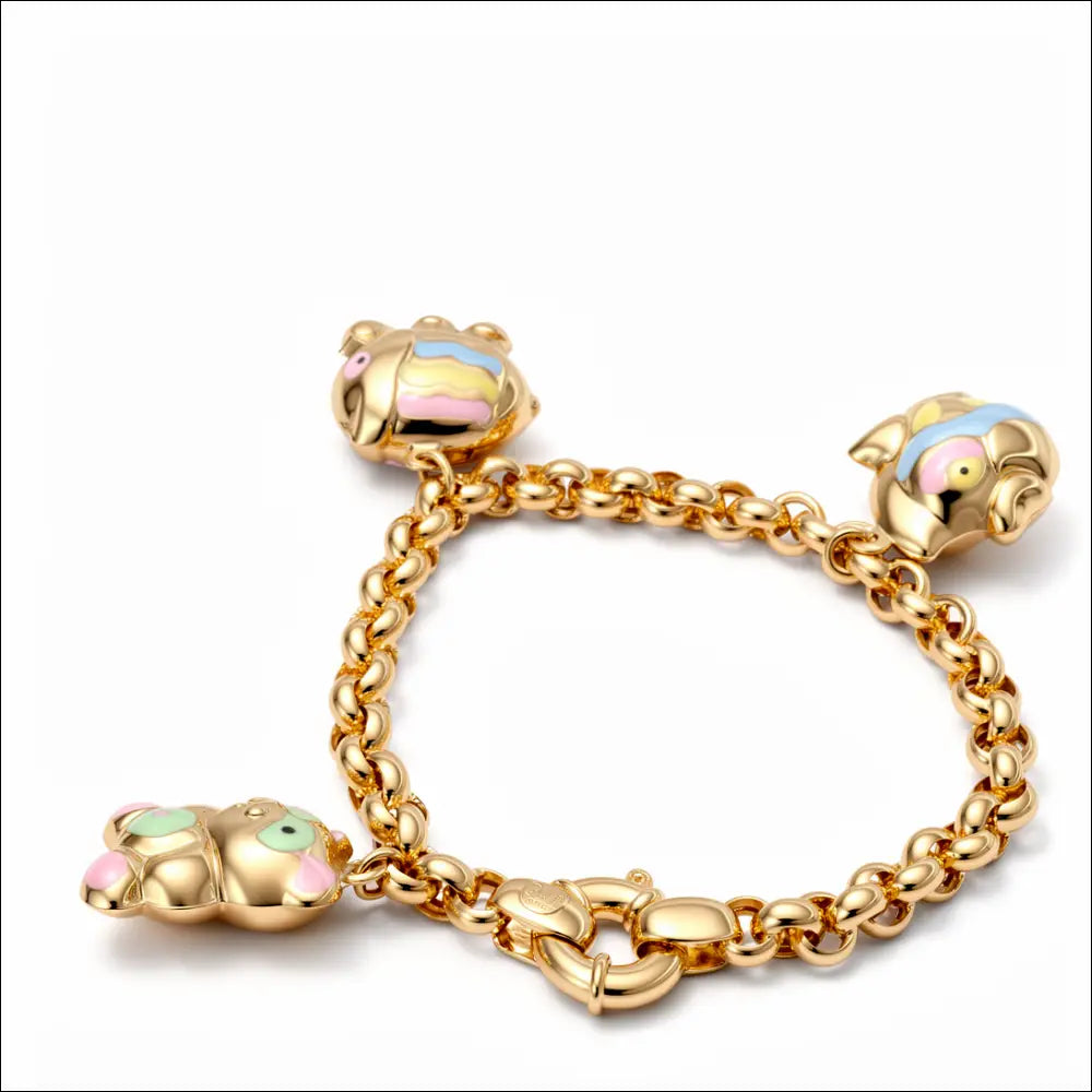 Bracciale donna oro giallo con tre ciondoli di UNOAERRE|bonini-gioielli