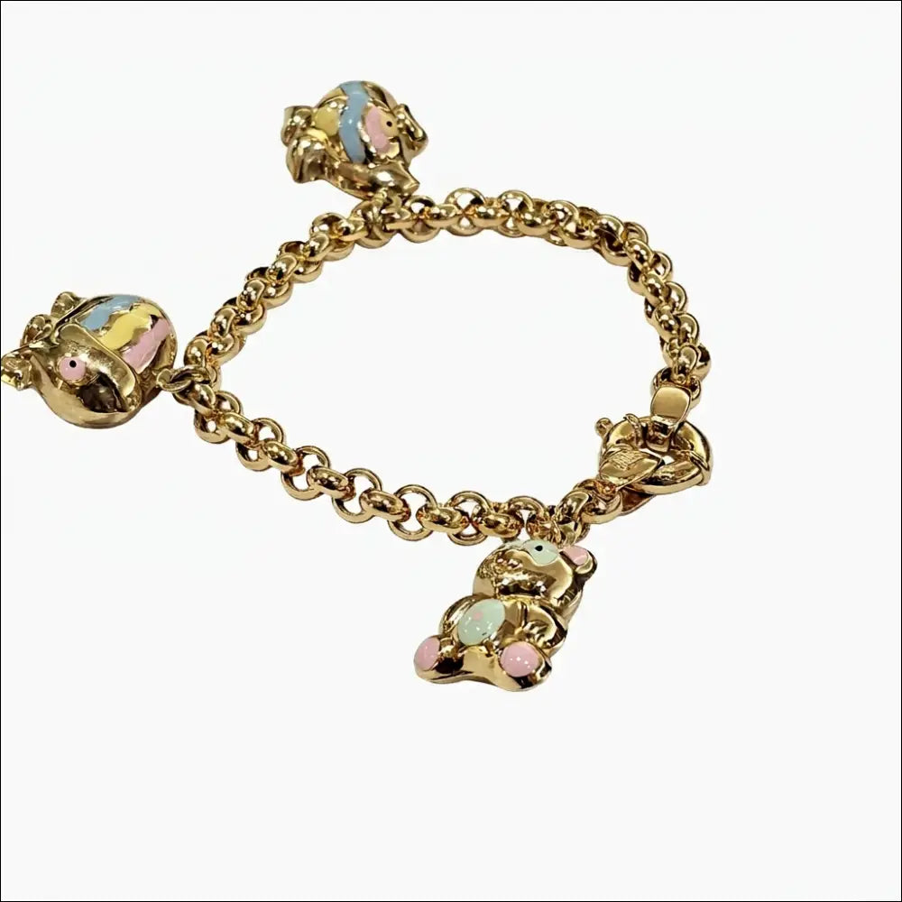 Bracciale donna oro giallo con tre ciondoli di UNOAERRE|bonini-gioielli