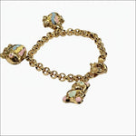 Bracciale donna oro giallo con tre ciondoli di UNOAERRE|bonini-gioielli