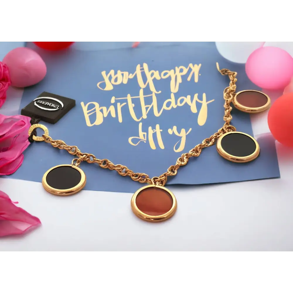 bracciale oro rosa ciondoli corniola e onice UNOAERRE|bonini-gioielli