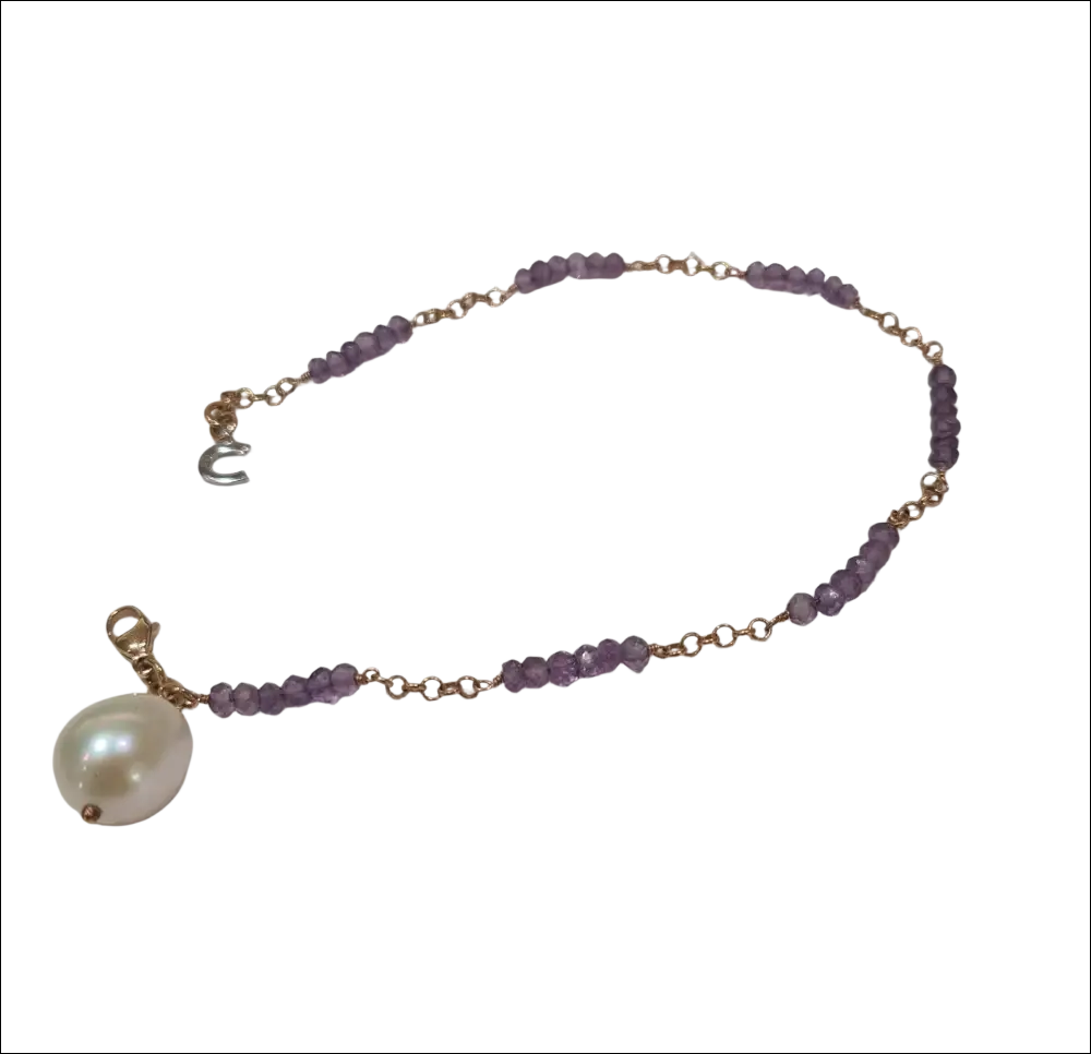 Bracciale Oro Rosé Comete BRP 148 con perla bianca e gemma viola
