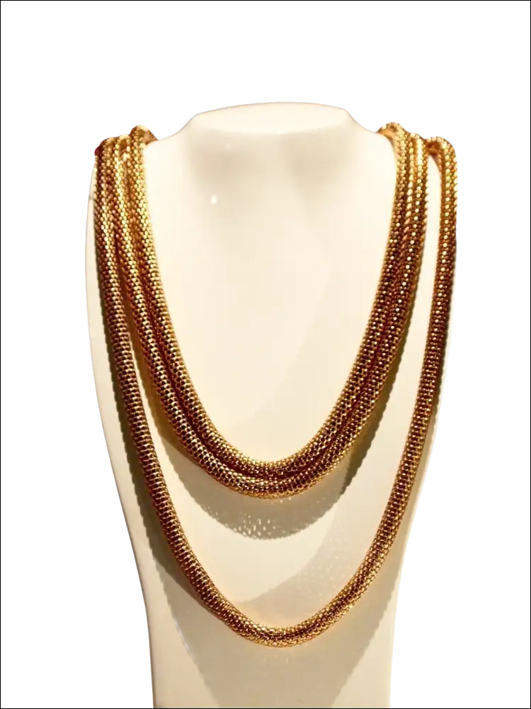 Collana lunga donna Calvin Klein Impulsive Oro Rosé con catene multiple su manichino bianco