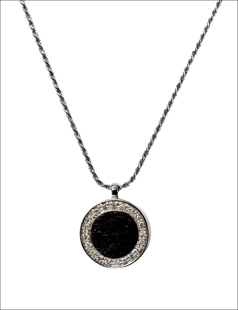 Collana Salvini Segreti in oro bianco con pendente circolare, centro nero e cristalli chiari