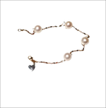 Bracciale COMETE BRP 144 in oro rosé con perle rosa e cuore
