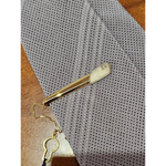 Fermacravatta in oro bianco e giallo 750/1000 UNOAERRE|bonini-gioielli