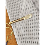 Fermacravatta in oro bianco e giallo 750/1000 UNOAERRE|bonini-gioielli