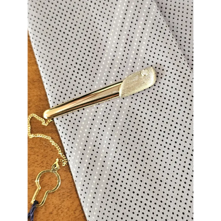 Fermacravatta in oro bianco e giallo 750/1000 UNOAERRE|bonini-gioielli