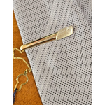 Fermacravatta in oro bianco e giallo 750/1000 UNOAERRE|bonini-gioielli