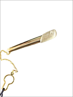 Fermacravatta oro bianco giallo e zircone UNOAERRE con gemma foglia