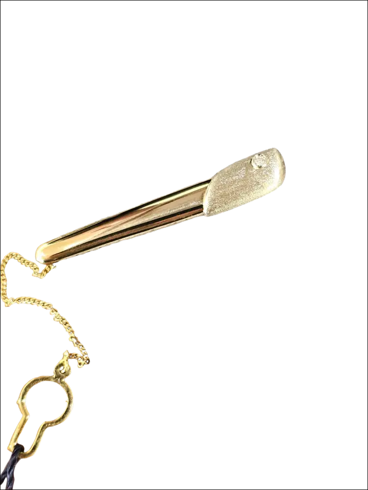 Fermacravatta oro bianco giallo e zircone UNOAERRE con gemma foglia