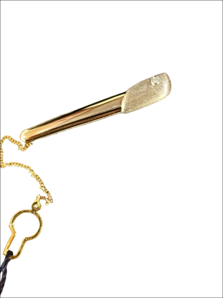 Fermacravatta Oro Bianco Giallo e Zircone UNOAERRE con gemma cilindrica oro