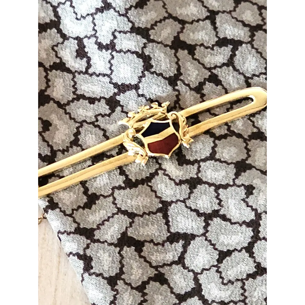 Fermacravatta oro giallo 750/1000 con blasone in smalto - fermacravatta