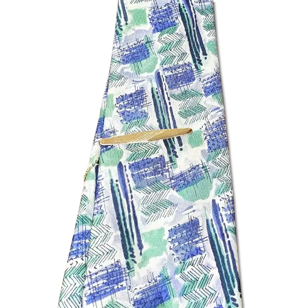 Fermacravatta oro giallo 750/1000lucido con zigrinatura centrale - fermacravatta