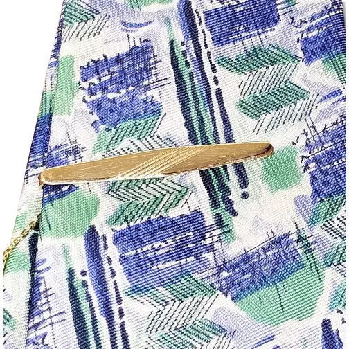 Fermacravatta oro giallo 750/1000lucido con zigrinatura centrale - fermacravatta