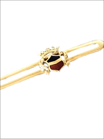 Fermacravatta oro giallo con blasone smaltato rosso e nero