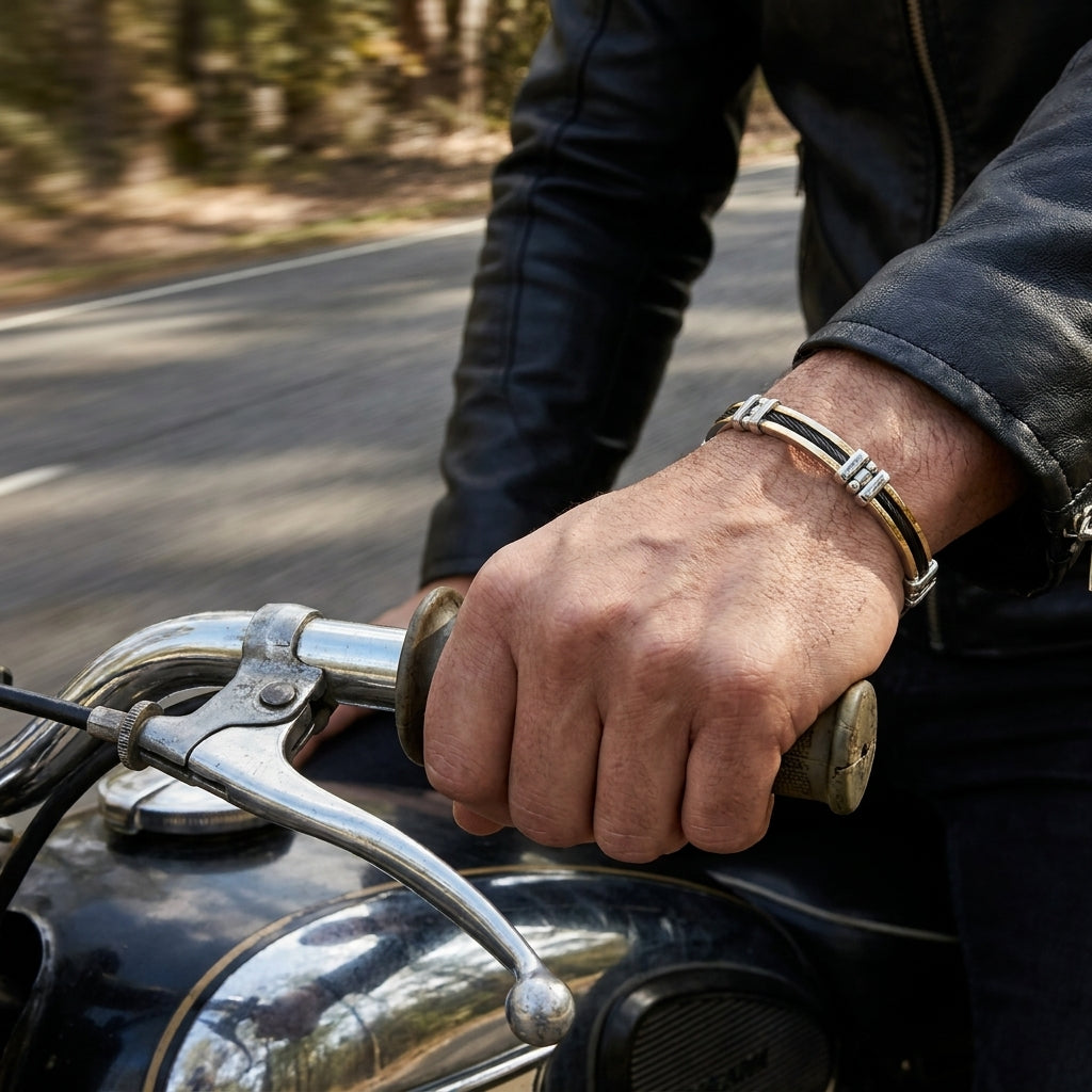 Bracciale uomo oro giallo e acciaio nero|bonini-gioielli