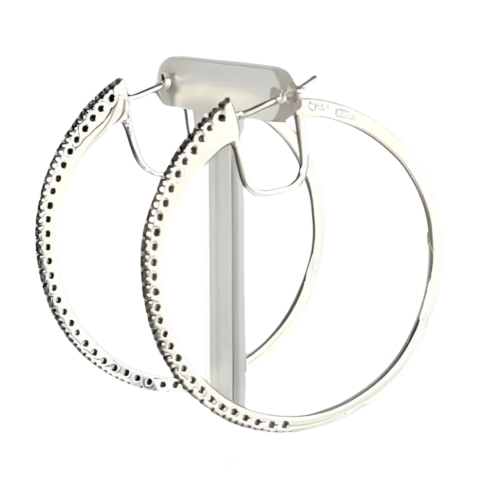 Orecchini cerchio oro bianco e diamanti con pietre incastonate eleganti