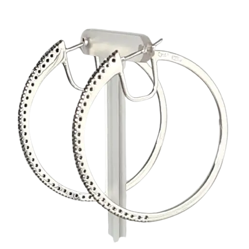 Orecchini cerchio oro bianco e diamanti con pietre incastonate eleganti