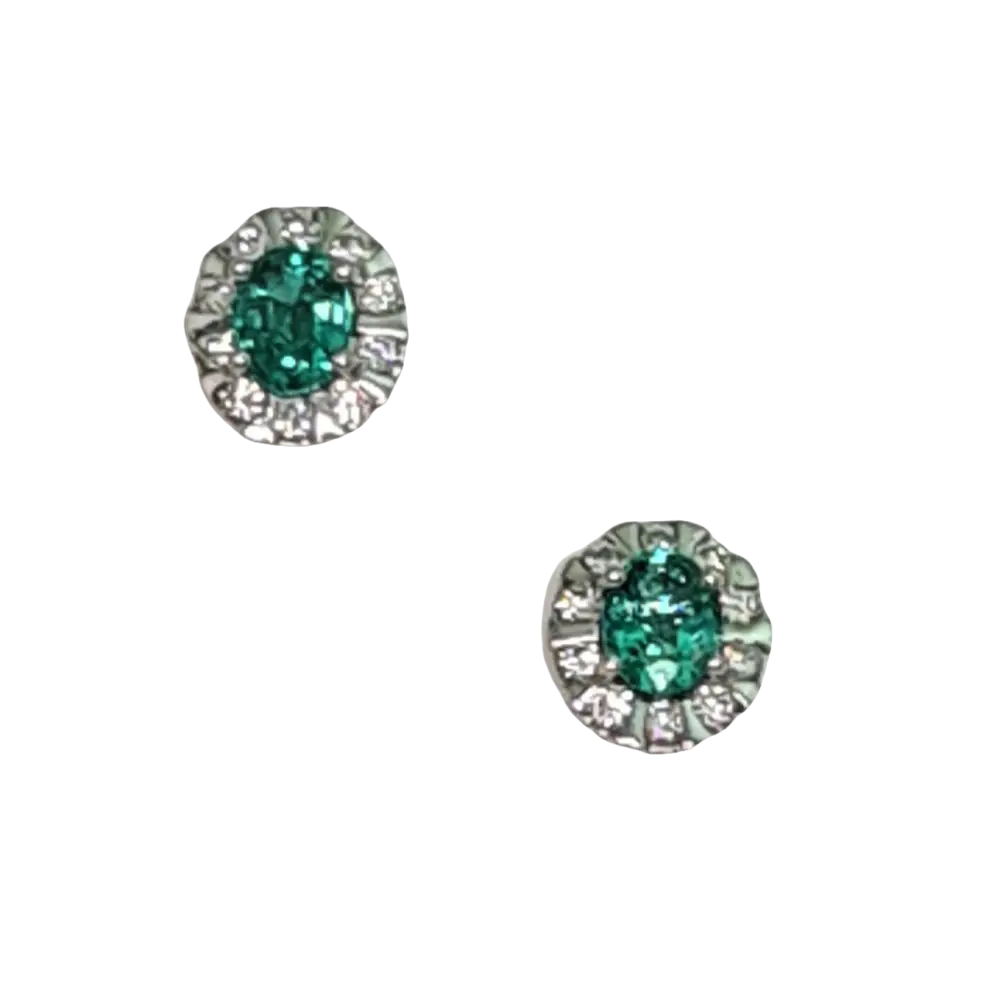 Orecchini Smeraldi Diamanti Oro Bianco Anniversario Matrimonio con orecchini a perno ovali smeraldo e diamanti