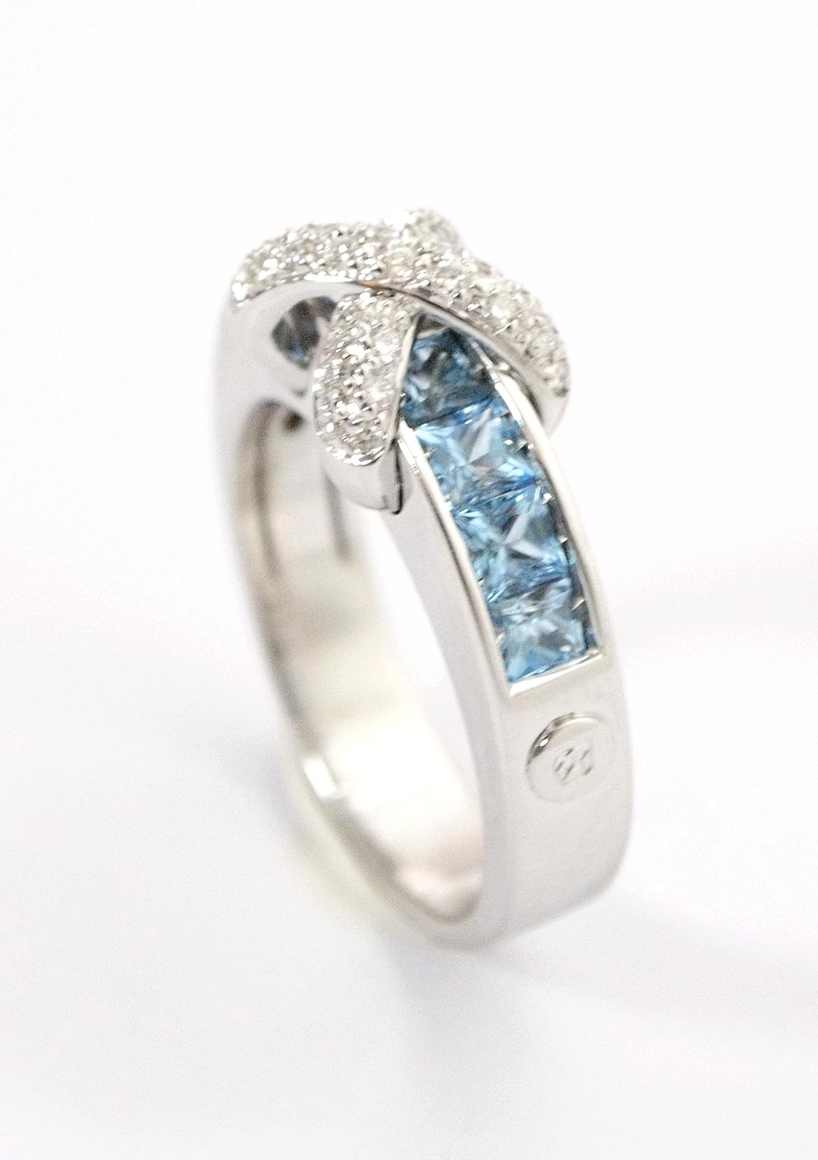 Anello CENTOVENTUNO oro bianco, diamanti e topazi azzurri - bonini-gioielli