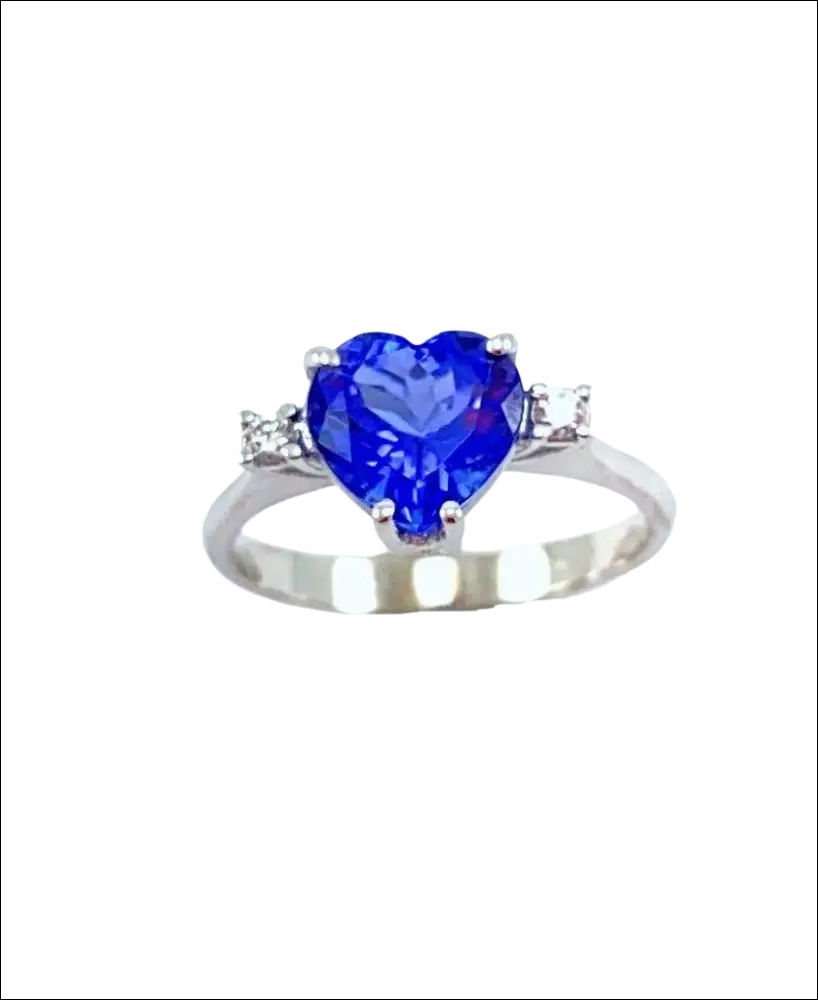 Anello tanzanite a cuore blu con diamanti, oro bianco e argento