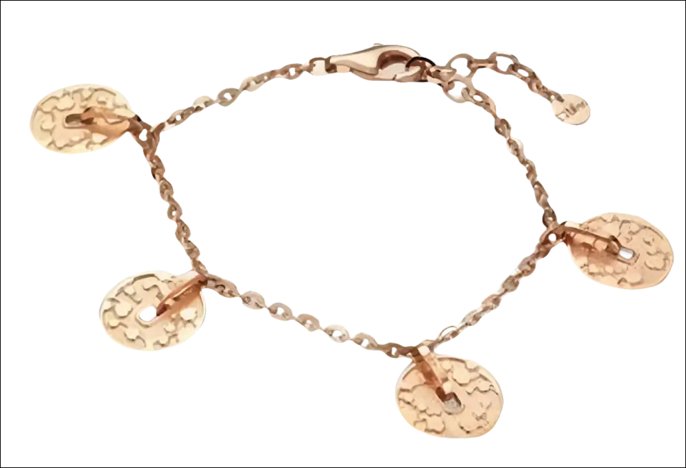 Bracciale in bronzo dorato con charms moneta e dettagli a texture e forma di chiave